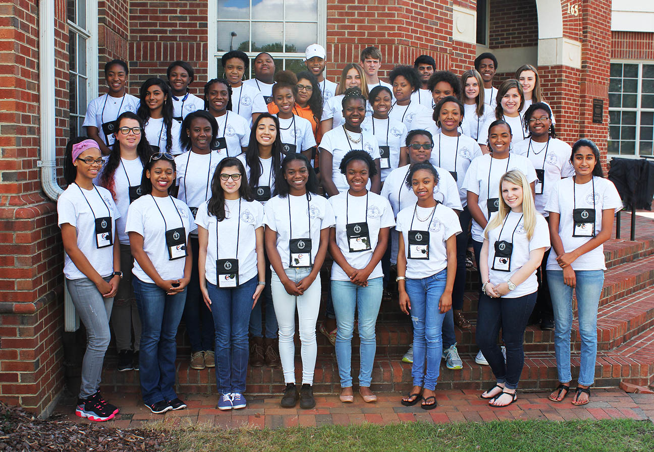 2016 Passport Students Front Row (L to R): Jada B. Pankey; Nia S. Sweatt; Margaret McDonald; Avion Harris; Zafira Harris; Asia Watkins; Haley Salmons; Bianca Desai. 2nd Row: Hannah P. Brown; Jordyn Starr; Layla Tawhid; Yazmia Snipes; Michyla Greene. 3rd Row: Joshualan Parrish; Tatyana Pulley; Kazara Williams. 4th Row: Prattheeba Suthaharan; Jahlia Williams; Sakari Law; Alexis Williams; Nijah Edwards; Laura Lugo. 5th Row: Adrienne Mitchell; Geneva Harrison; Genesis Logan; Brenda Arellano-Perez; Melina Gonzalez; Camille Dixon; Jennifer Scott; Meagan Hopkins. 6th Row: Cedric Dixon; Ty’Monte Bulluck; Christian Stokes; Venkat Ravuri; Rakeem Yakubu. Passport recipients not pictured: Lexie Bayliss; Rachel Figard; Maria Fritzler; Daniela Guzman Hernandez; Kamryn Hough; Vanna Labi; Ethan Lazo; Gabriela Lugo; Naijha Nsehti; Emili Potts; Jamal West; Tamar Wester; Asia White. 