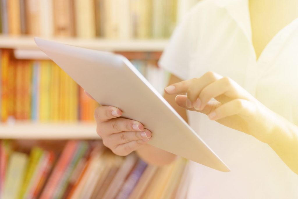 A nurse accesses the NC AHEC Digital Library using her iPad