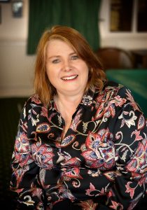 A smiling photo of Dr. Linda Hacking, the 2019 NACT UK Traveling Fellow.